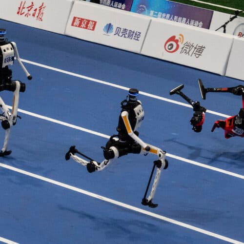 World humanoid robot games show runners breaking records, bursting into flames